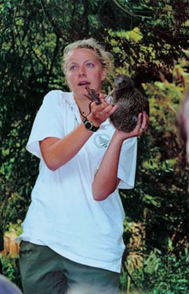 Jillana Robertson holds a kiwi