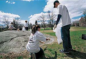 UNH Community Service and Leadership students bagging trash