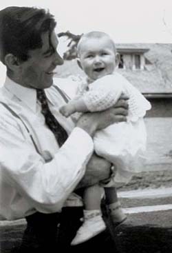 Ted Weaver holding daughter Ann, 1949