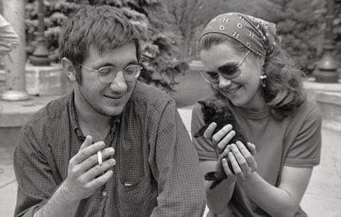 Two students and kitten