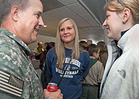 UNH volleyball players welcome home soldiers