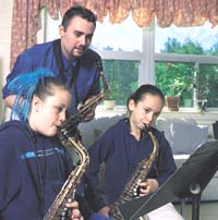 Matt Ignos playing saxophone - Photo by Perry Smith / UNH Photographic Services