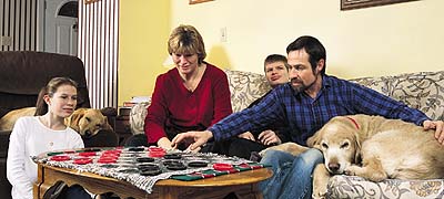 Salter family playing checkers